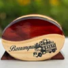 Servilletero artesanal de madera con diseño de chiva y la palabra "Barranquilla".