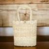 Bolso artesanal con diseño en palma de iraca hecho a mano por artesanas colombianas